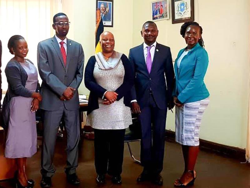CIU team posses with the Somali Ambassador.
